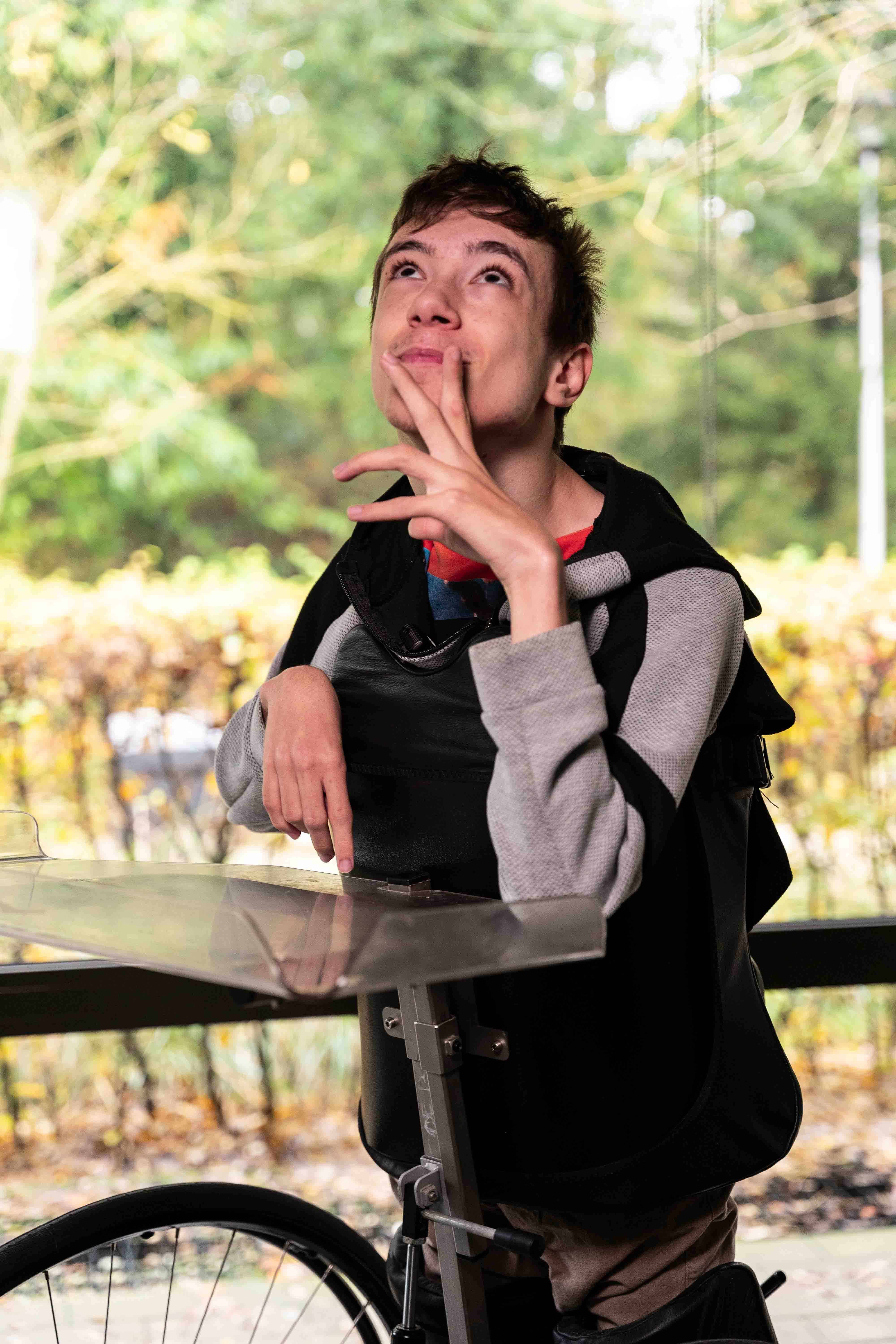 Participant Lukas describing his dreams about how shockwave therapy can help him